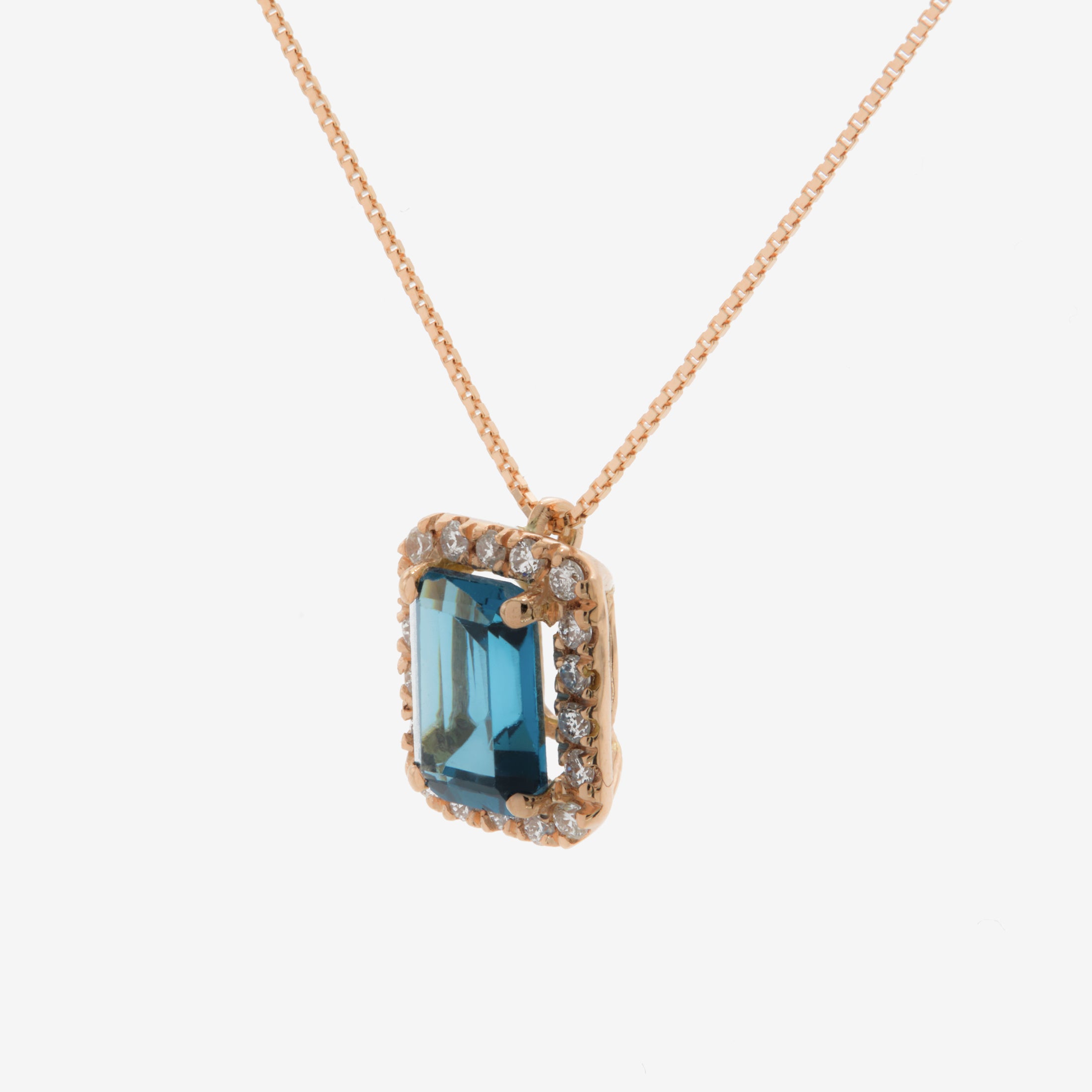Rose gold necklace with blue topaz and diamonds