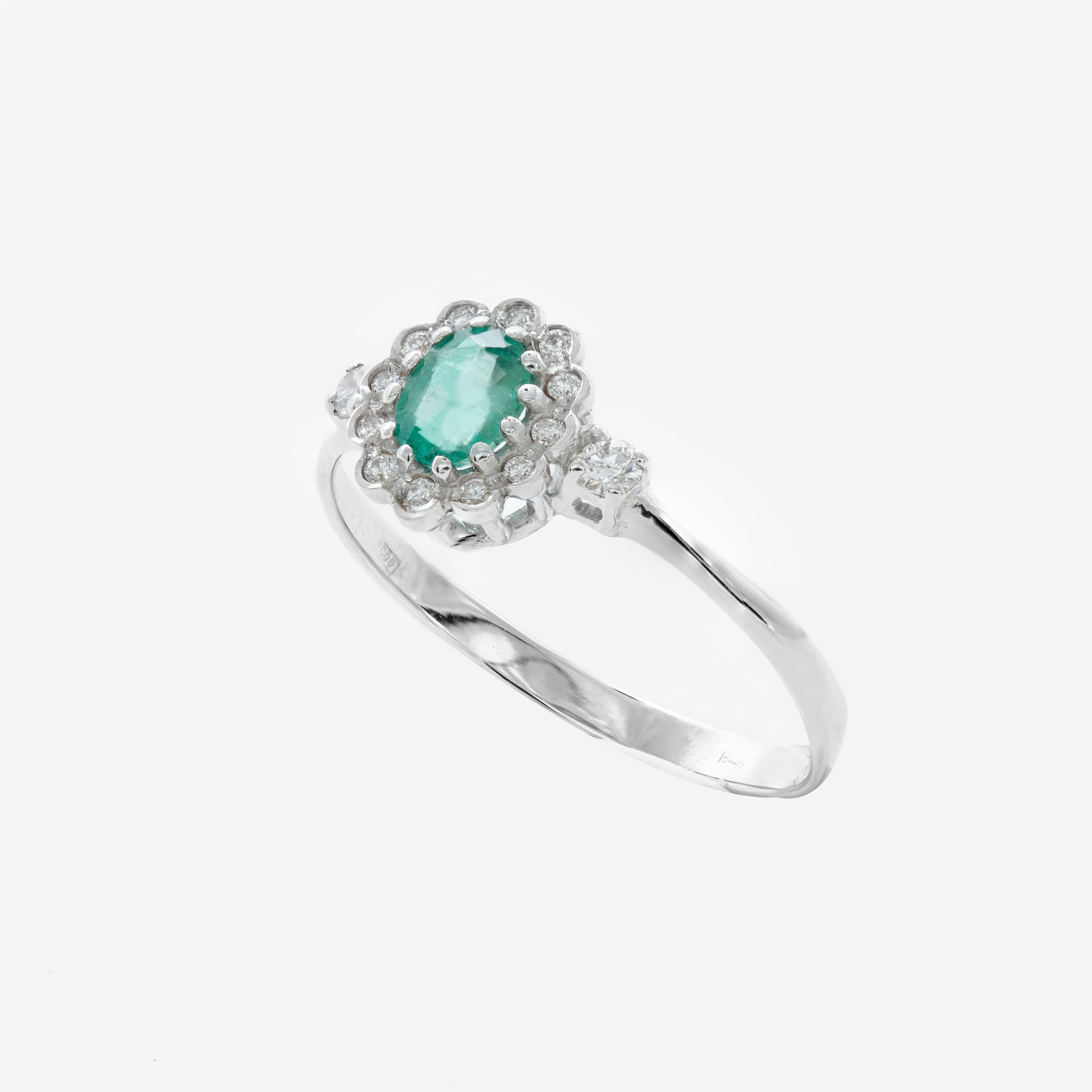 Ozzy ring with emeralds and diamonds