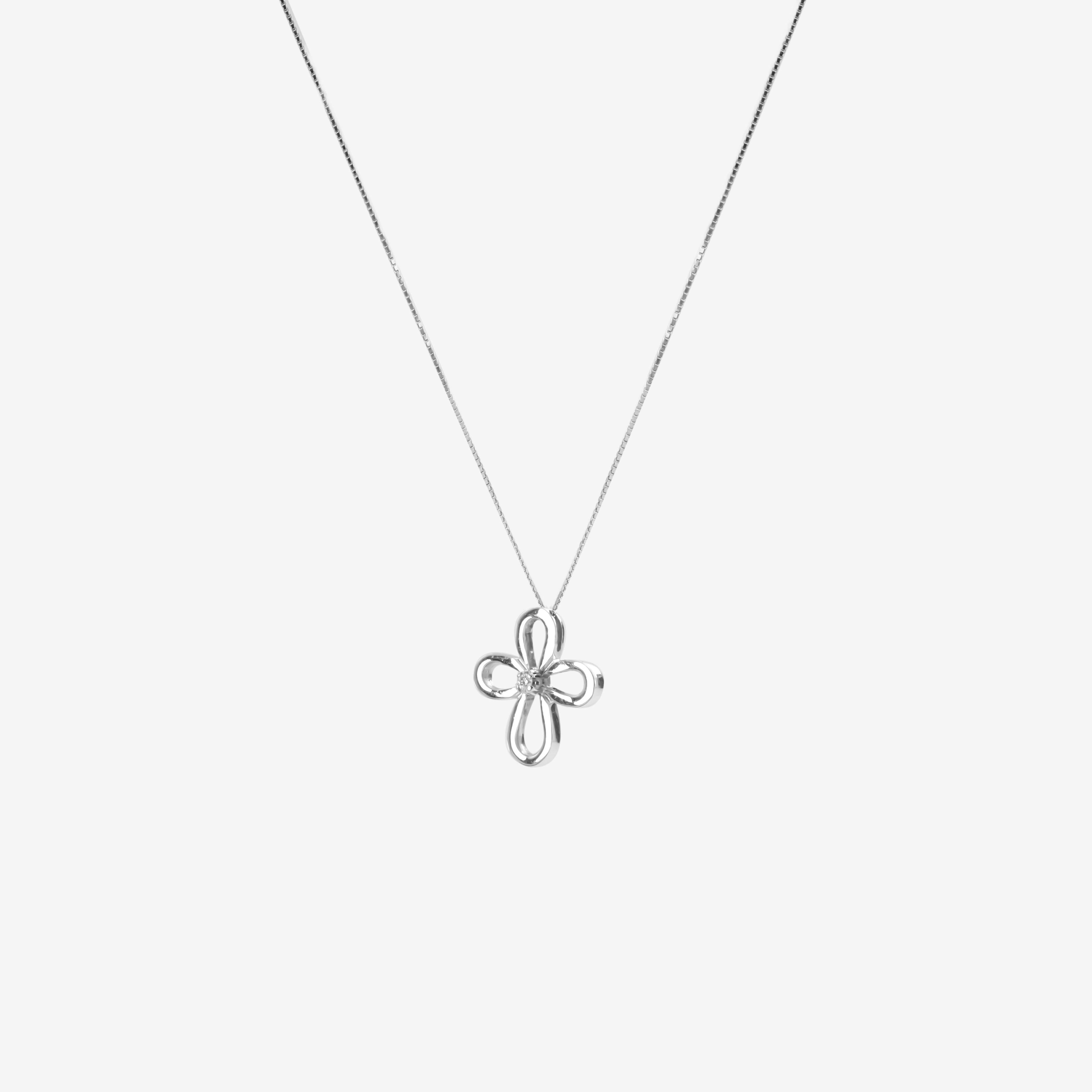 Empty cross necklace with diamond