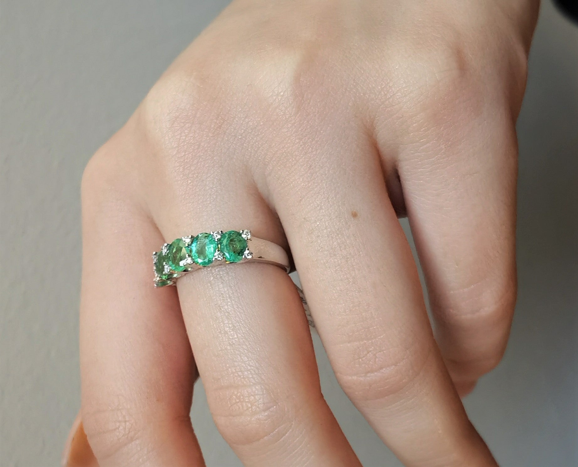 Lane ring with emeralds and diamonds